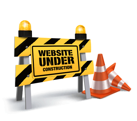 Construction safety barrier saying website under construction with traffic cones and flashing lights